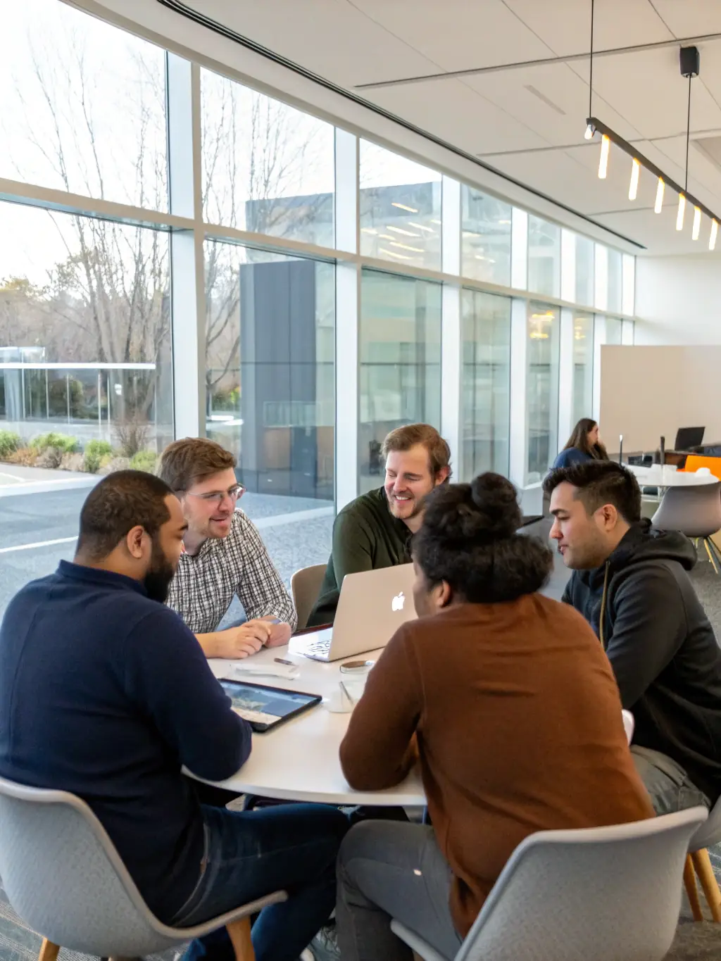 A collaborative image showing the Velonix AI team brainstorming and discussing custom solutions with a client, highlighting the personalized approach.